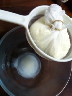 Give the cheese a squeeze, drain and discard the excess liquid