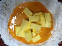 Pound the butter to soften it and work it in...